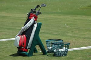 Golf-bag-and-buckets-of-balls